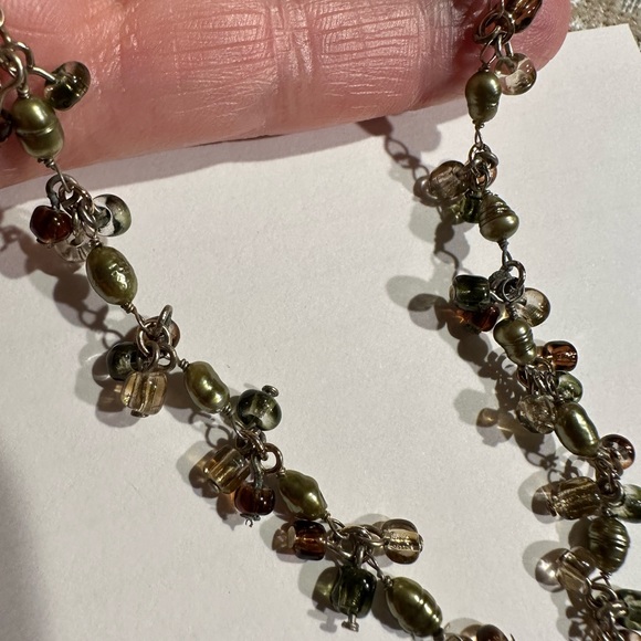 Beautiful amber stone hangs from chain with delicate clusters of small beads. - Picture 6 of 13